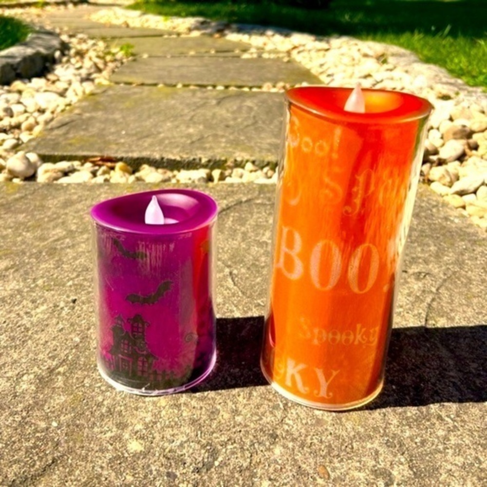 Halloween LED flickering illuminating pillar candles
Set of two